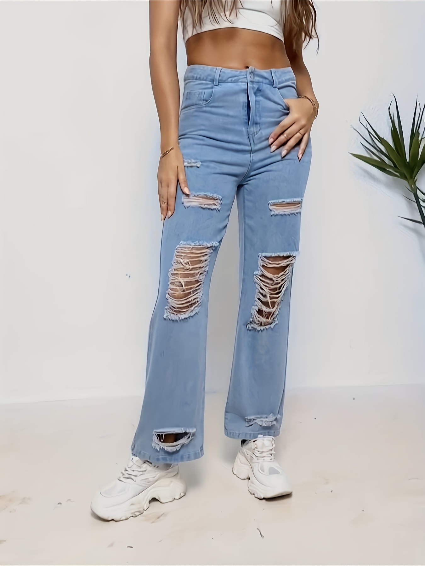 jeans-rotos-mujer-470aqy-1.jpg
